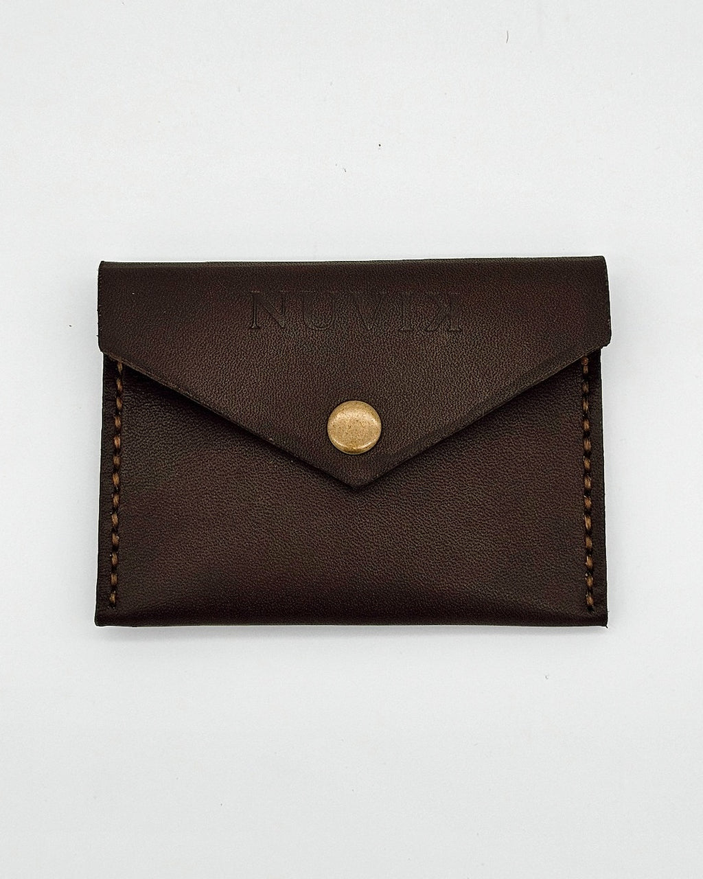 NUVIK Duo – Porta silbato y monedero de cuero.
