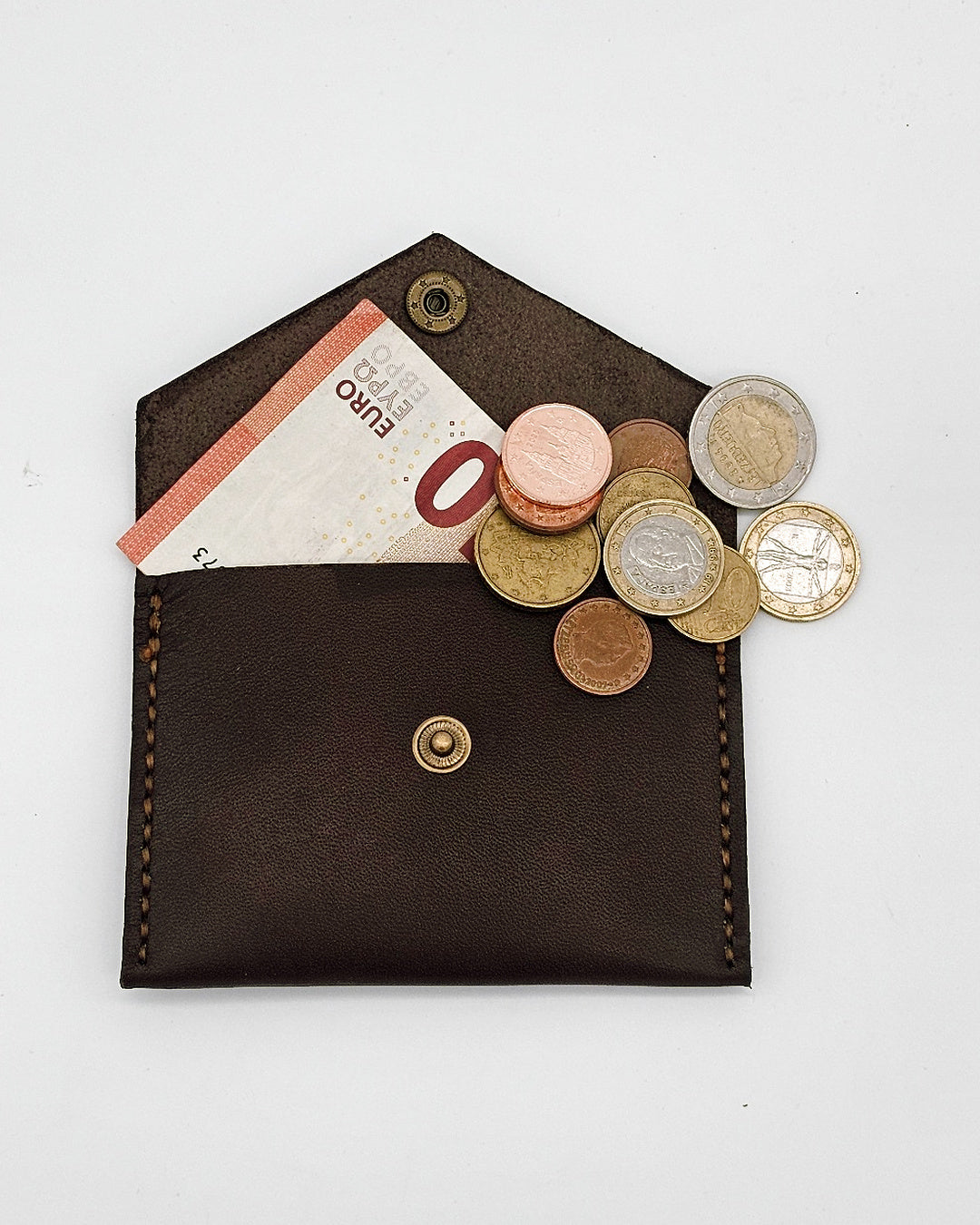 NUVIK Duo – Porta silbato y monedero de cuero.
