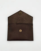 NUVIK Duo – Porta silbato y monedero de cuero.